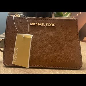 Brand new, never used MICHAEL Michael Kors coin pouch. Tags still attached